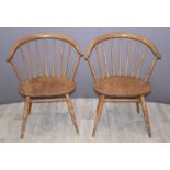 Six Ercol light elm dining chairs including two armchairs