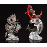 Two Swarovski Crystal animal groups comprising Tutelary Spirit Admirable Fish and The Dragon