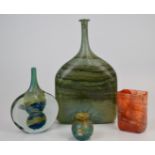 Four pieces of Mdina and similar glassware comprising a lolipop vase signed 'Mdina', an orange