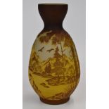 Gallé style cameo glass vase decorated with an extensive mountain and lake scene in brown and yellow
