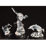 Three Swarovski Crystal clear and coloured glass animals comprising two whales and a dolphin,