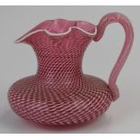 Venini Murano style latticinio cranberry and white glass jug with applied handle, 10cm tall.