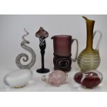 Seven pieces of art glass including two jugs with applied decoration, candlestick, tortoise