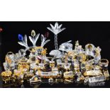 Over 60 Swarovski Crystal Memories and similar clear glass and gilt metal ornaments including