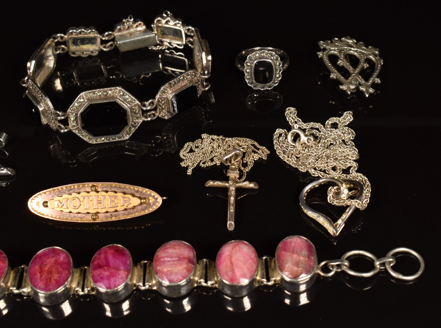 A silver bracelet set with rubies, a silver bracelet set with onyx, silver pendants and chains, - Image 3 of 3