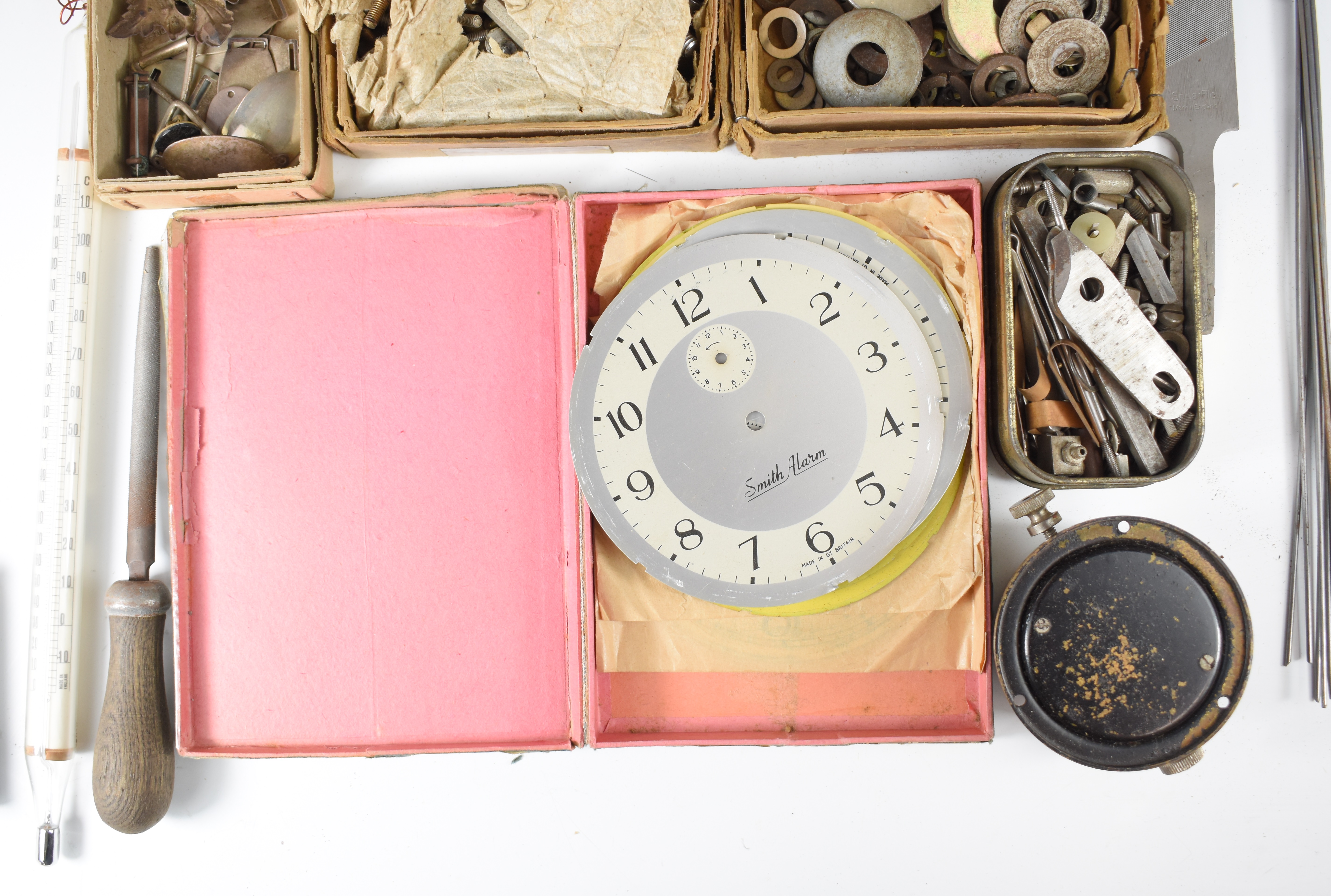 Collection of clock parts, keys, tools, needle files, engraver's wax, clamps etc, in three trays - Image 7 of 21