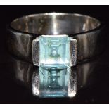 A 14k white gold ring set with a square cut topaz, 5.0g, size L