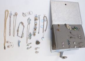 A collection of silver jewellery including earrings, rings, bracelets, pendants, charms etc