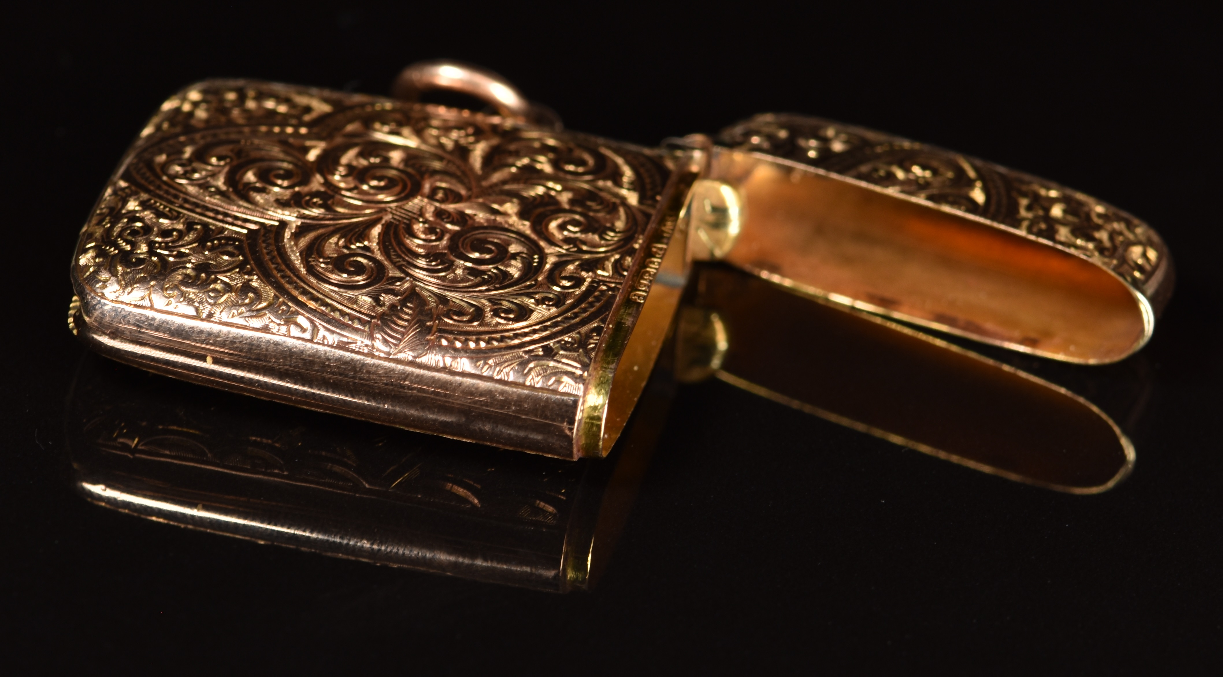 Victorian 9ct gold vesta case, with engraved decoration, Chester 1898, maker's mark rubbed, height - Image 2 of 3