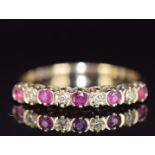 A 9ct gold ring set with rubies and diamonds, 1.2g, size J