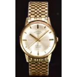 Rotary 9ct gold gentleman's wristwatch with gold hands and hour markers, silver dial and signed 17