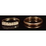 A 9ct gold wedding band and a 9ct gold ring set with cubic zirconia, 3.4g