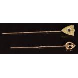 Two 9ct gold stick pins, 3.5g