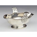 French late 19th or early 20thC silver twin handled sauce boat with French silver marks, maker