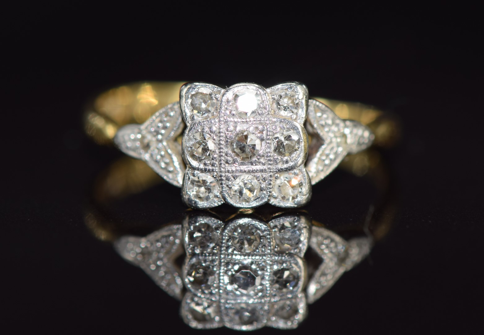 Art Deco 18ct gold ring set with diamonds in a platinum setting (split band), 2.5g, size M