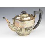 George V hallmarked silver teapot with reeded lower body, Birmingham 1924, maker Henry Williamson