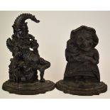 Pair of cast iron Punch and Judy doorstops, height of tallest 32cm