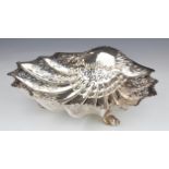 Victorian hallmarked silver centrepiece formed as a shell shaped bowl with pierced and embossed