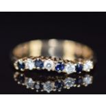 A 9ct gold ring set with sapphires and diamonds, 1.6g, size O