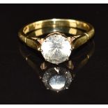 An 18ct gold ring set with a cubic zirconia, 3.9g, size N