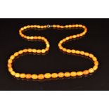 Baltic amber necklace made up of 77 beads, the largest 10 x 13mm, 30g