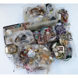 A collection of jewellery including a large collection of chains, brooches, vintage earrings,
