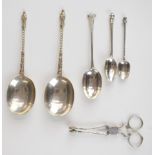 Georgian and later hallmarked silver cutlery including sugar nips and a pair of apostle or similar