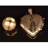 A 9ct gold heart shaped locket and 9ct gold football charm, 10.1g