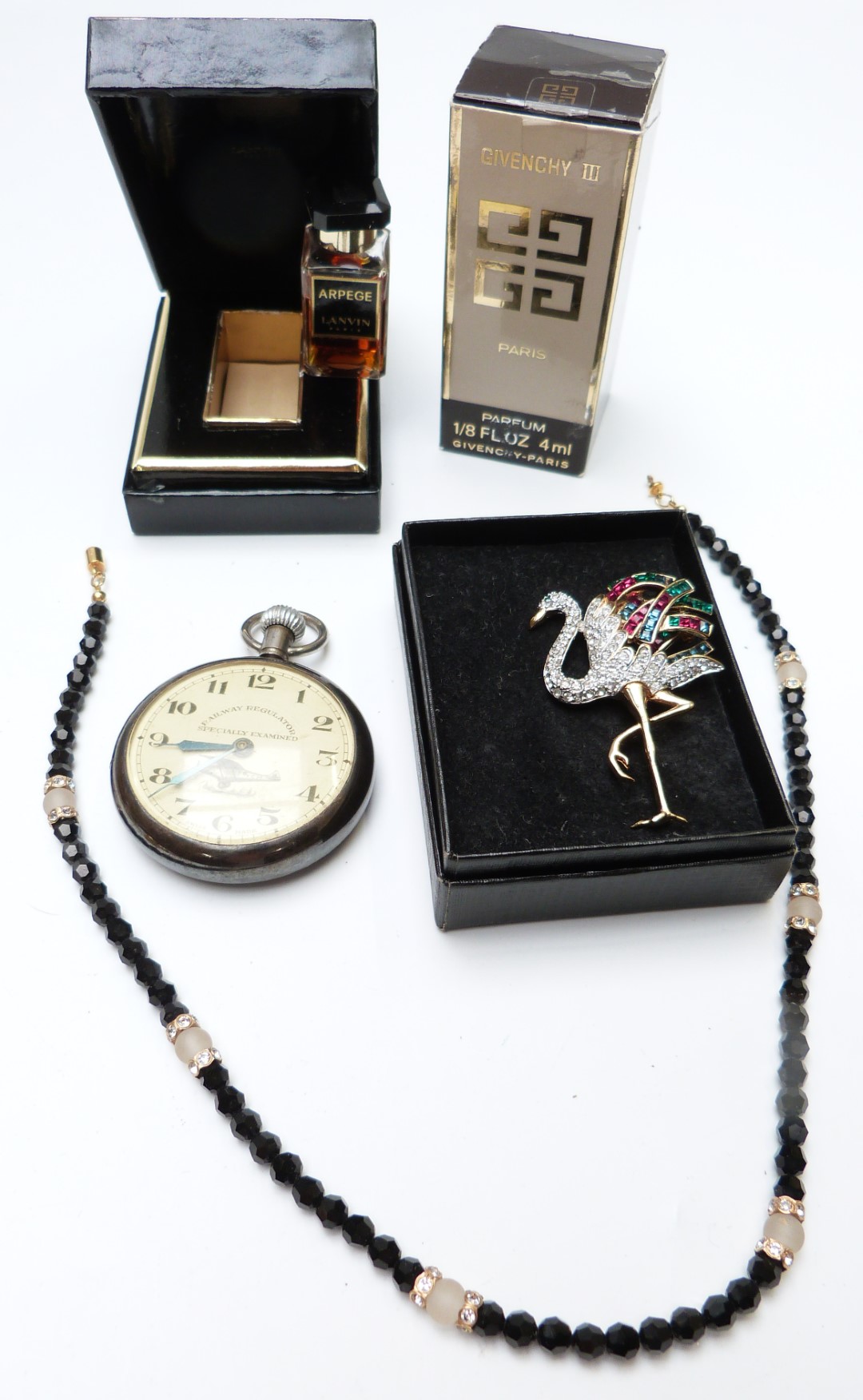 A collection of costume jewellery including 9ct gold brooch (2g), flamingo brooch, two silver fob - Image 2 of 6