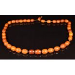 Baltic amber necklace made up of 37 beads, each 13 x 17mm, 66g