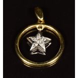 An 18ct gold circular pendant set with diamonds in a star setting, 2.7g