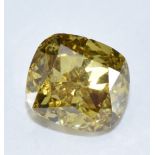 A loose natural 0.52ct cushion cut greenish yellow diamond with AnchorCert certificate
