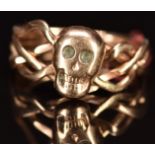 Victorian 9ct rose gold puzzle ring with skull decoration, 6.7g, size T