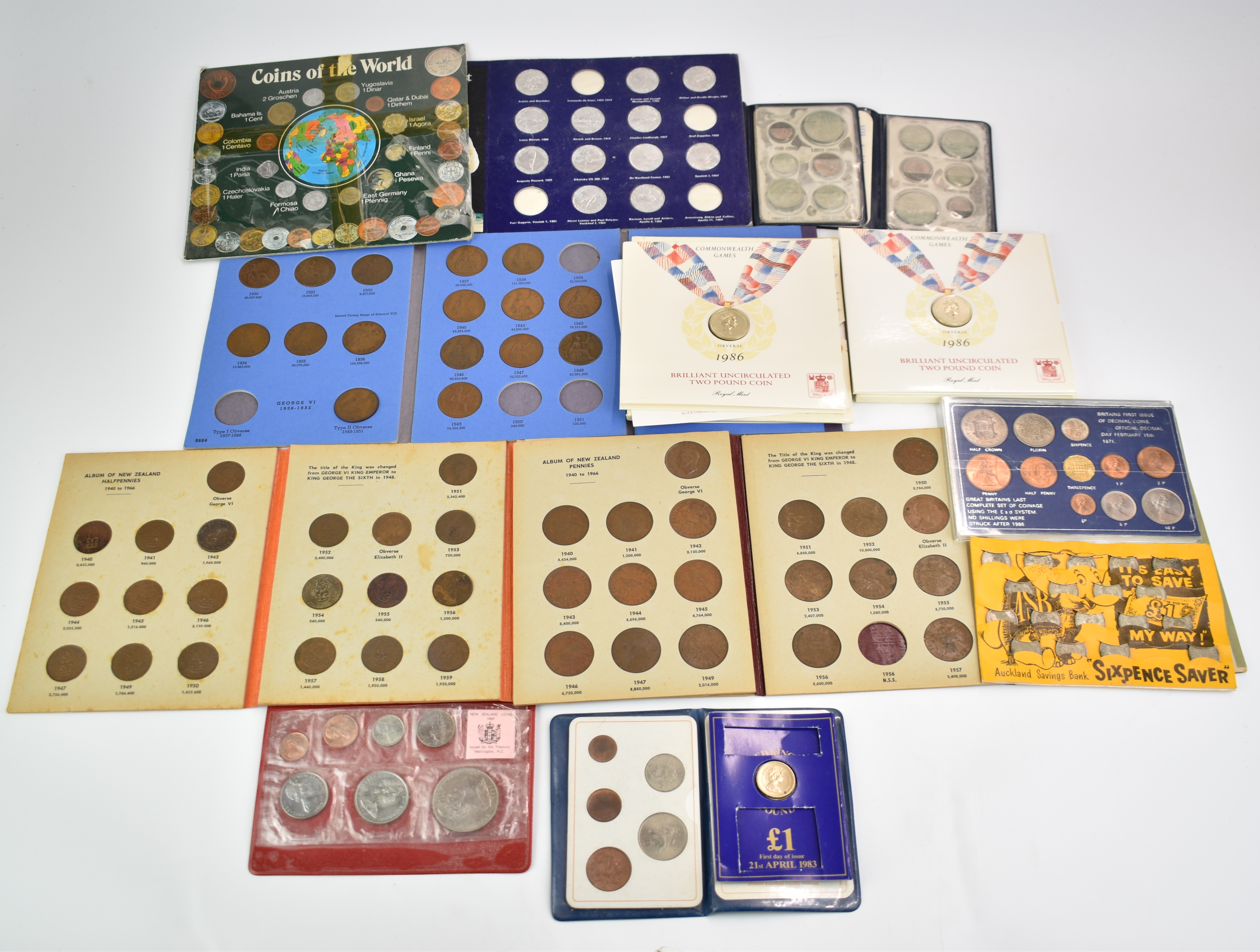 A collection of various coin presentation packs to include Whitman type folders, Commonwealth Games,