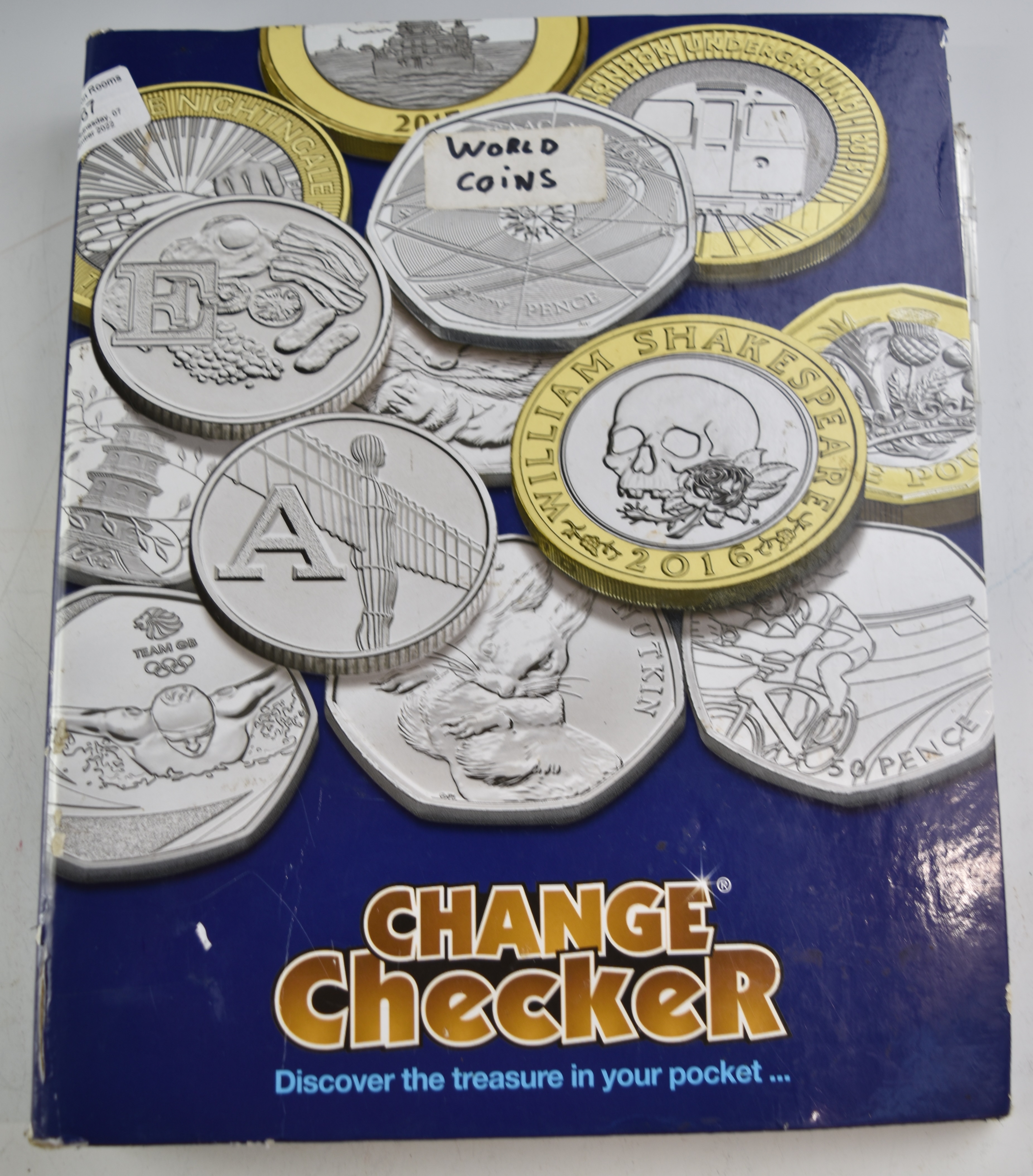 A collection of world coins contained in a Change Checker album - Bild 6 aus 6