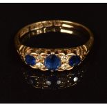 An 18ct gold ring set with sapphires and diamonds, Birmingham 1896, 3.2g