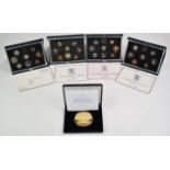 Royal Mint proof cased coin sets for 1983, 1984, 1985 and 1986, together with a Jubilee Mint