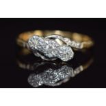 Art Deco 18ct gold ring set with three diamonds in a platinum twist setting, 2.8g, size P