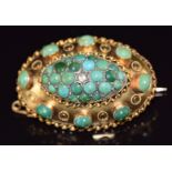 Victorian 15ct gold brooch set with turquoise cabochons in a domed setting, with rope twist