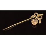 Victorian 9ct gold stick pin in the form of a bow and heart set with seed pearls and a diamond, 3.2g