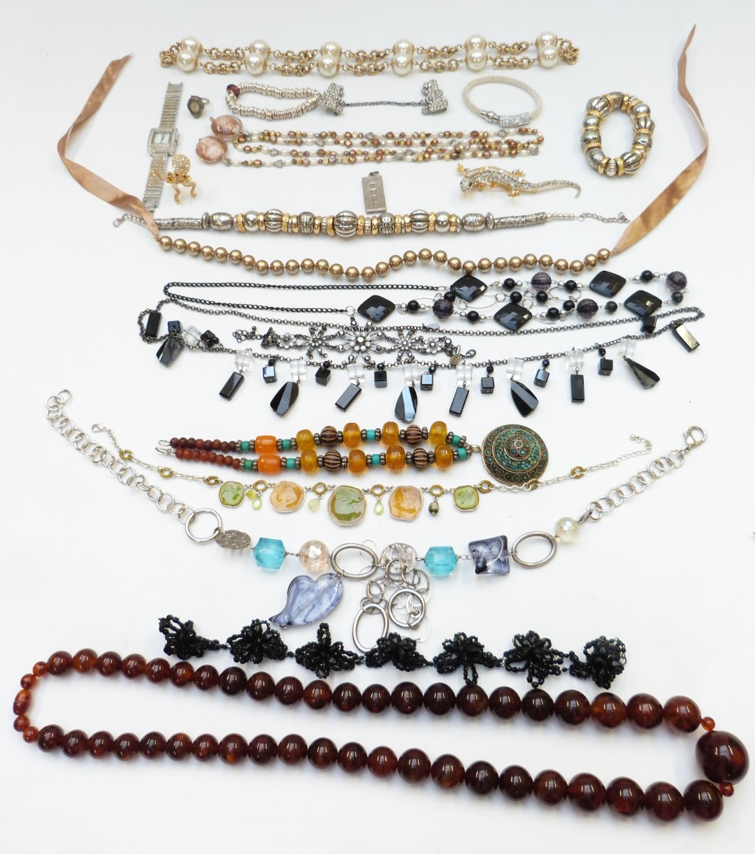 A collection of jewellery including Butler and Wilson brooch, pearl necklace, Kenneth Lane ring in