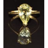 A 9ct gold ring set with a pear cut topaz, 3.3g, size M/N