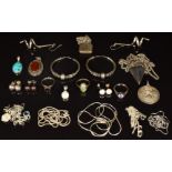 A 9ct gold ring, silver chains, silver pendants and silver earrings