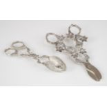 Set of Dutch silver serving nips together with a set of snips with 835 silver mark, length of longer