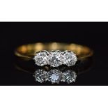 An 18ct gold ring set with three diamonds each approximately 0.14ct, 1.8g, size O
