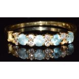 An 18ct gold ring set with topaz and diamonds (two stones missing), 2.5g, size N