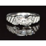 A platinum ring set with round cut diamonds, total diamond weight approximately 0.5ct, 8g, size I