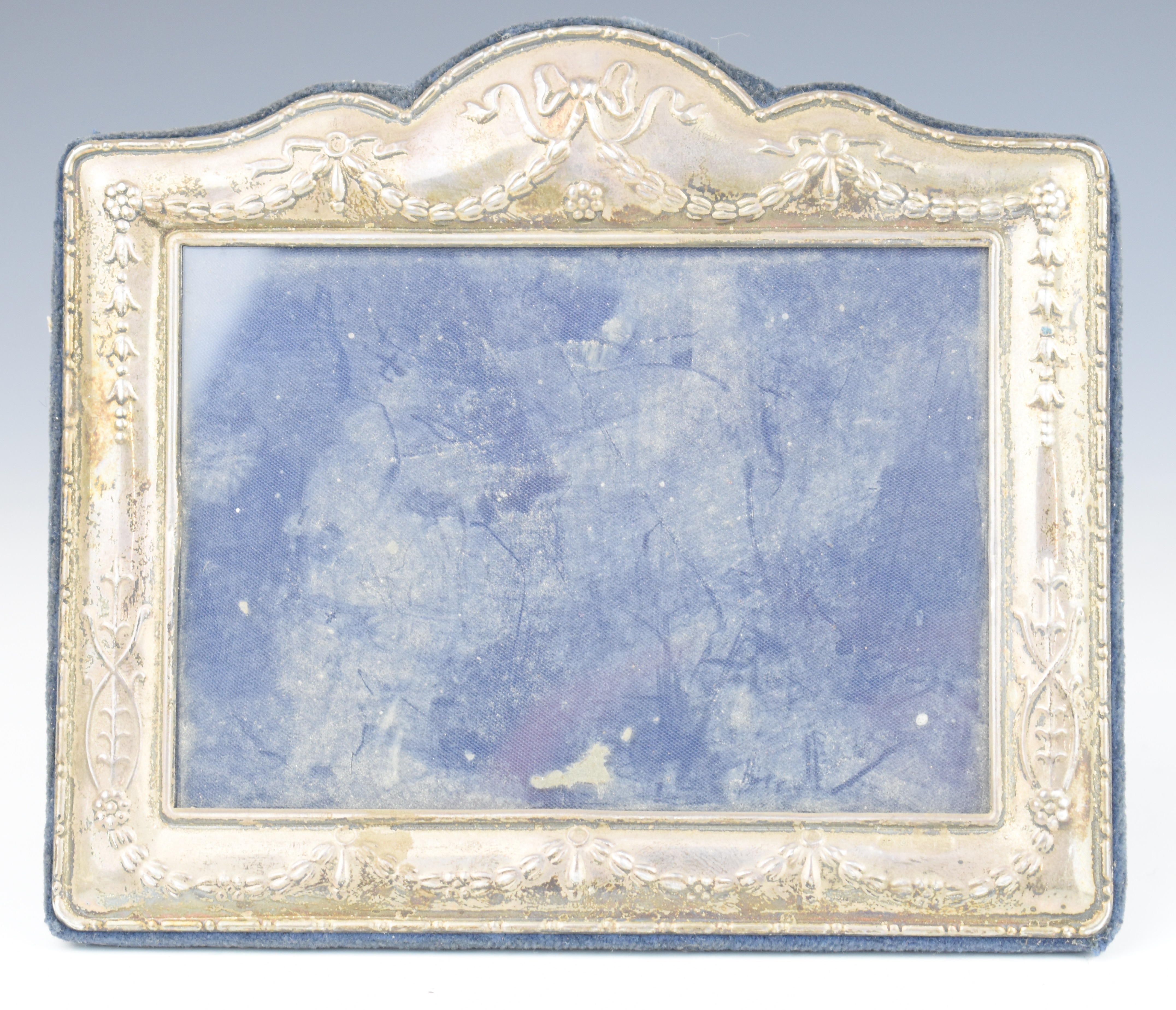 Modern hallmarked silver photograph frame with floral swag decoration and easel back, Sheffield