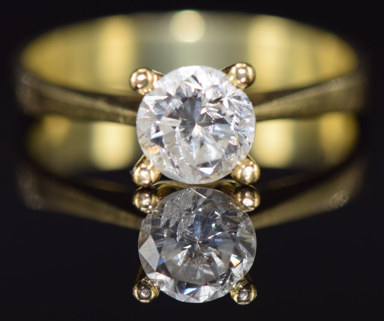 An 18k gold ring set with a round cut diamond of approximately 0.95ct, 4.3g, size P - Image 2 of 3