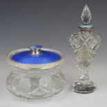 Two hallmarked silver and blue guilloché enamel mounted cut glass dressing table items, diameter